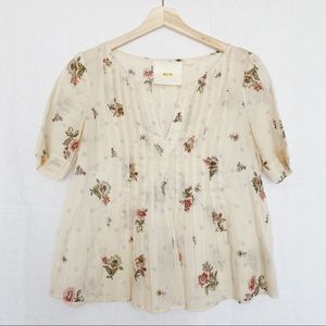 Anthropologie light blouse with floral accent